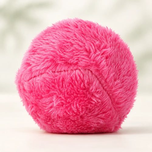 RoamRoll rolling ball wearing its pink plush cover.