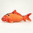FinFlip Red Fish plush cat toy with red-orange scales and dark spots.